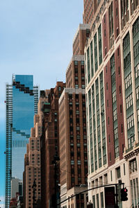 Low angle view of buildings against clear sky