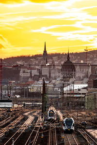 High angle view of cityscape against sky during sunset