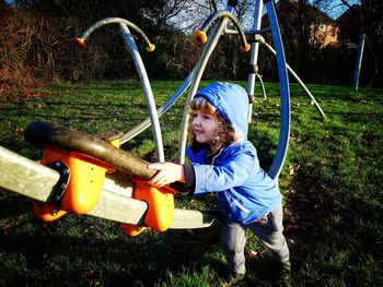 Cute girl playing in playground