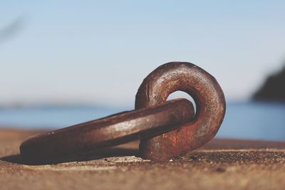 Close-up of rusty metal against clear sky