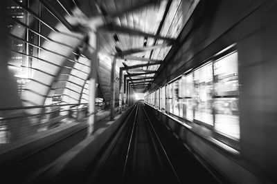 Blurred motion of railroad track in tunnel