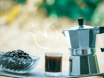 Close-up of coffee cup on table