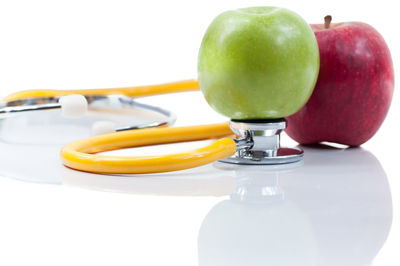Close-up of apple against white background