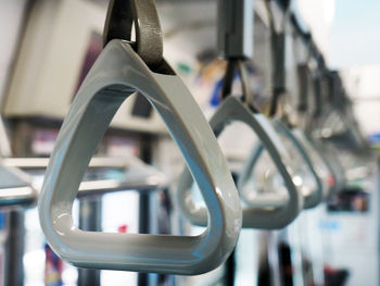 Handles hanging in bus