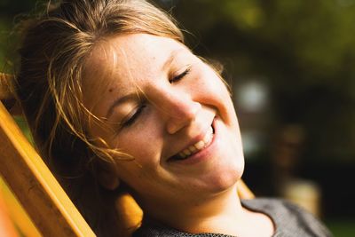 Close-up of smiling young woman