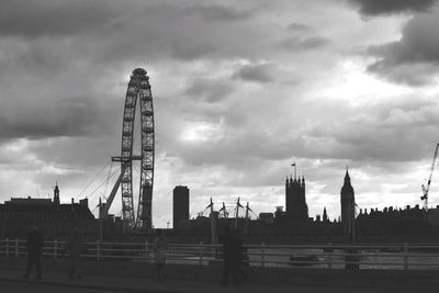 Low angle view of building against cloudy sky