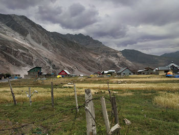 Scenic view of landscape and mountains against sky