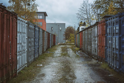 Large metallic containers on field