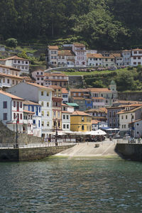 River amidst buildings in city