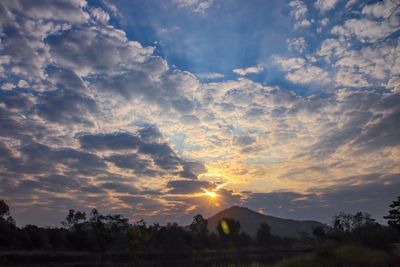 Scenic view of landscape against sky during sunset