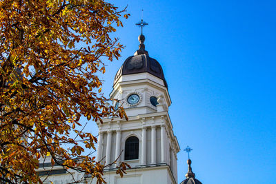 Low angle view of church against blue sky