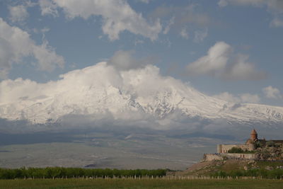 Panoramic view of landscape and mountains against sky