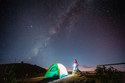 Low angle view of tent against sky at night