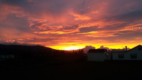 Scenic view of dramatic sky during sunset