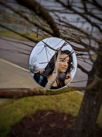 Portrait of young woman outdoors