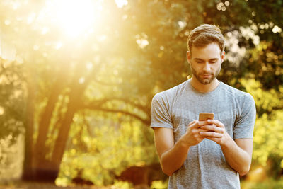 Young woman using mobile phone