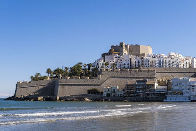 Old town of peniscola, castellón is a major tourist attraction on the spanish mediterranean coast.