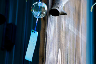 Close-up of water hanging from glass