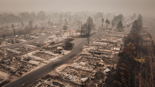Human caused wild fire destroys mobile homes and trailer parks.