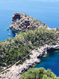 High angle view of bay against clear blue sky