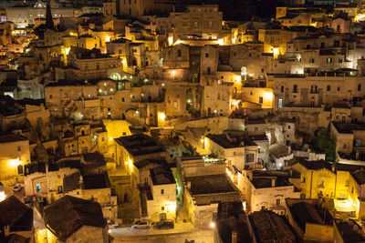 High angle view of illuminated buildings in town