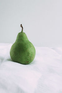 Close-up of apple against white background