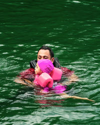 Portrait of girl in swimming pool