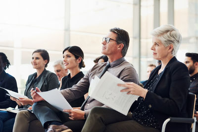 Group of people sitting in office