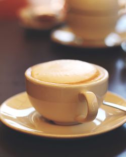 Close-up of cappuccino on table