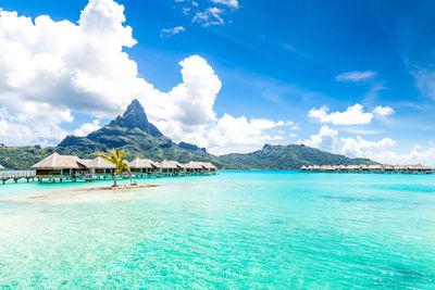 Scenic view of sea against blue sky