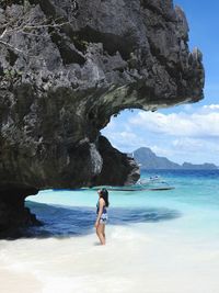 Woman standing in swimming pool
