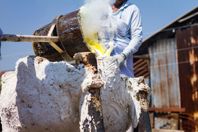 Man working on wood