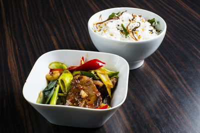 High angle view of salad in bowl on table