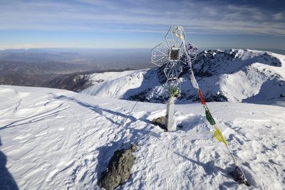 Snow covered mountain against sky