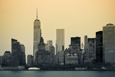 View of skyscrapers against sky during sunset