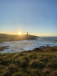 Scenic view of sea against sky during sunset