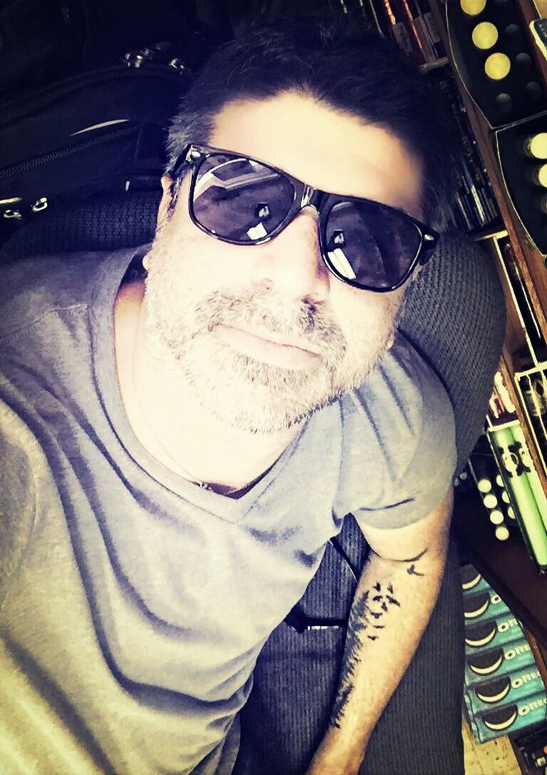 lifestyles, young adult, casual clothing, looking at camera, person, portrait, front view, young men, leisure activity, sunglasses, headshot, eyeglasses, waist up, mid adult, mid adult men, men, cap, beard