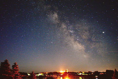 Low angle view of star field against sky at night