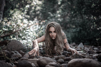 Portrait of a young woman in forest