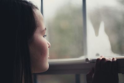 Close-up of woman looking away