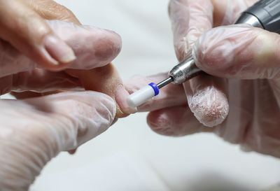 Close-up of woman holding hands