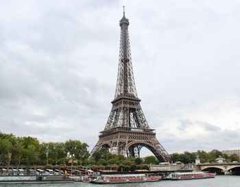 View of tower against cloudy sky