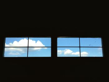 Low angle view of sky seen through window