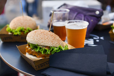 Close-up of beer and hamburgers 