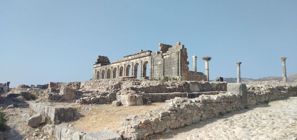 Old ruins against blue sky