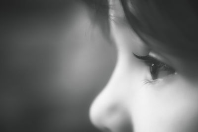 Close-up portrait of a girl looking away