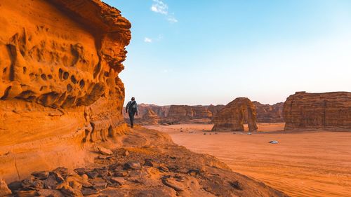 Rock formations on landscape against sky