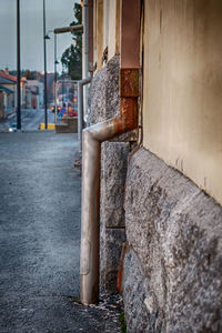 Close-up of  water drain on wall