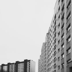 Low angle view of buildings against clear sky