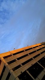 Low angle view of building against blue sky